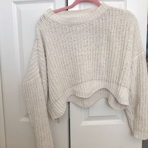 A cropped sweater